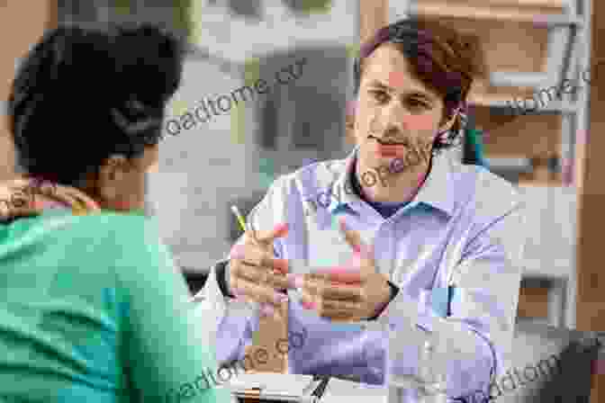 A Person Sitting And Actively Listening To Another Person Speaking. The Power Of Listening: Building Skills For Mission And Ministry