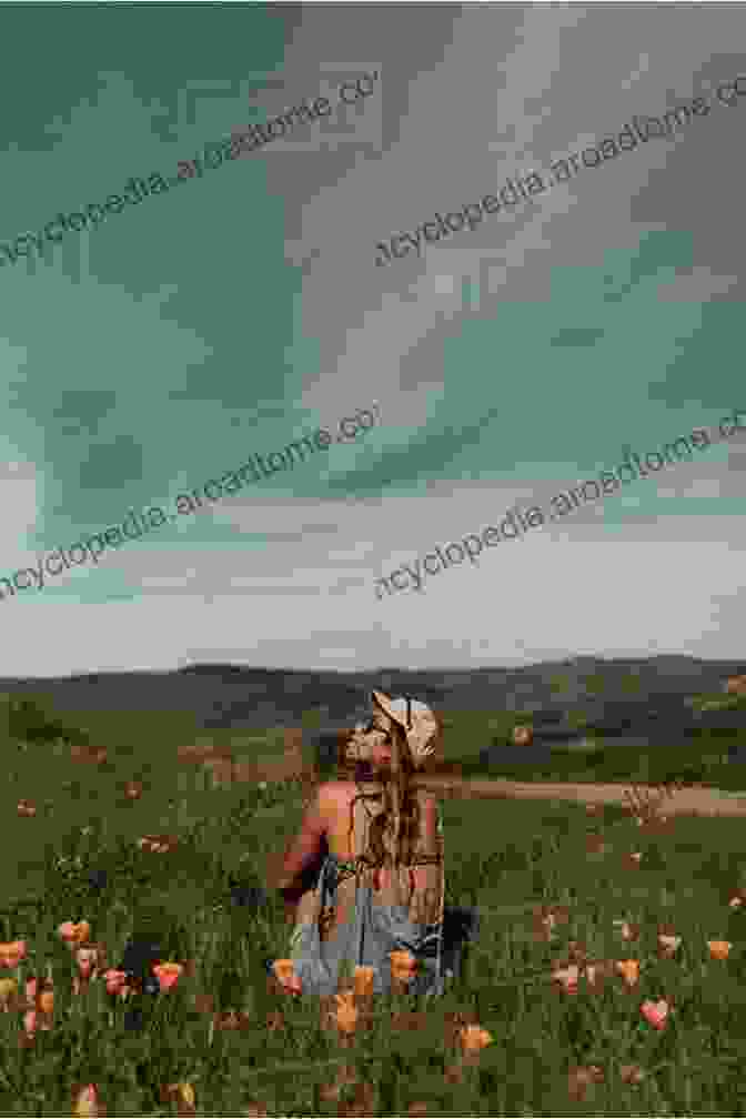 A Person Sitting In A Field Of Wildflowers, Looking Up At The Sky With A Sense Of Peace And Contentment. The Great Unconformity: Reflections On Hope In An Imperiled World