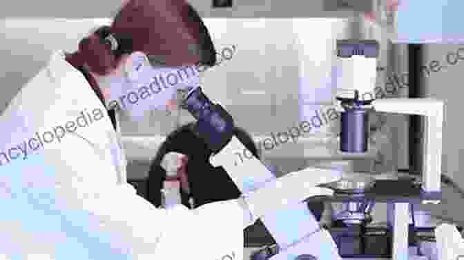 A Researcher Using A Microscope To Analyze Lymphoma Cells In A Laboratory. Advances In Lymphoma Research (Cancer Treatment And Research 85)