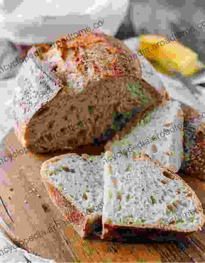 An Artisan Sourdough Loaf With A Golden Crust Kneadlessly Simple: Fabulous Fuss Free No Knead Breads