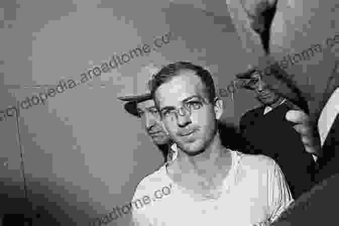 Lee Harvey Oswald Being Taken Into Custody After The Assassination Of John F. Kennedy Marina And Lee: The Tormented Love And Fatal Obsession Behind Lee Harvey Oswald S Assassination Of John F Kennedy