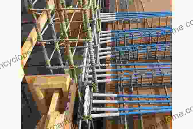 Photograph Of An Unbounded Post Tensioned Masonry Wall Being Constructed In A Building Behavior Of Unbounded Post Tensioned Masonry Walls (Springer Theses)